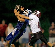 Pass Breakup PIM 021  A Tarpon Springs defender breaks up a pass to an East Lake receiver during a high school football game. - PhotosinMotion.net. : Tarpon Spring football photos, East Lake football pictures, Tampa Bay SPORTS photographer, FOOTBALL pictures, Photosinmotion.net